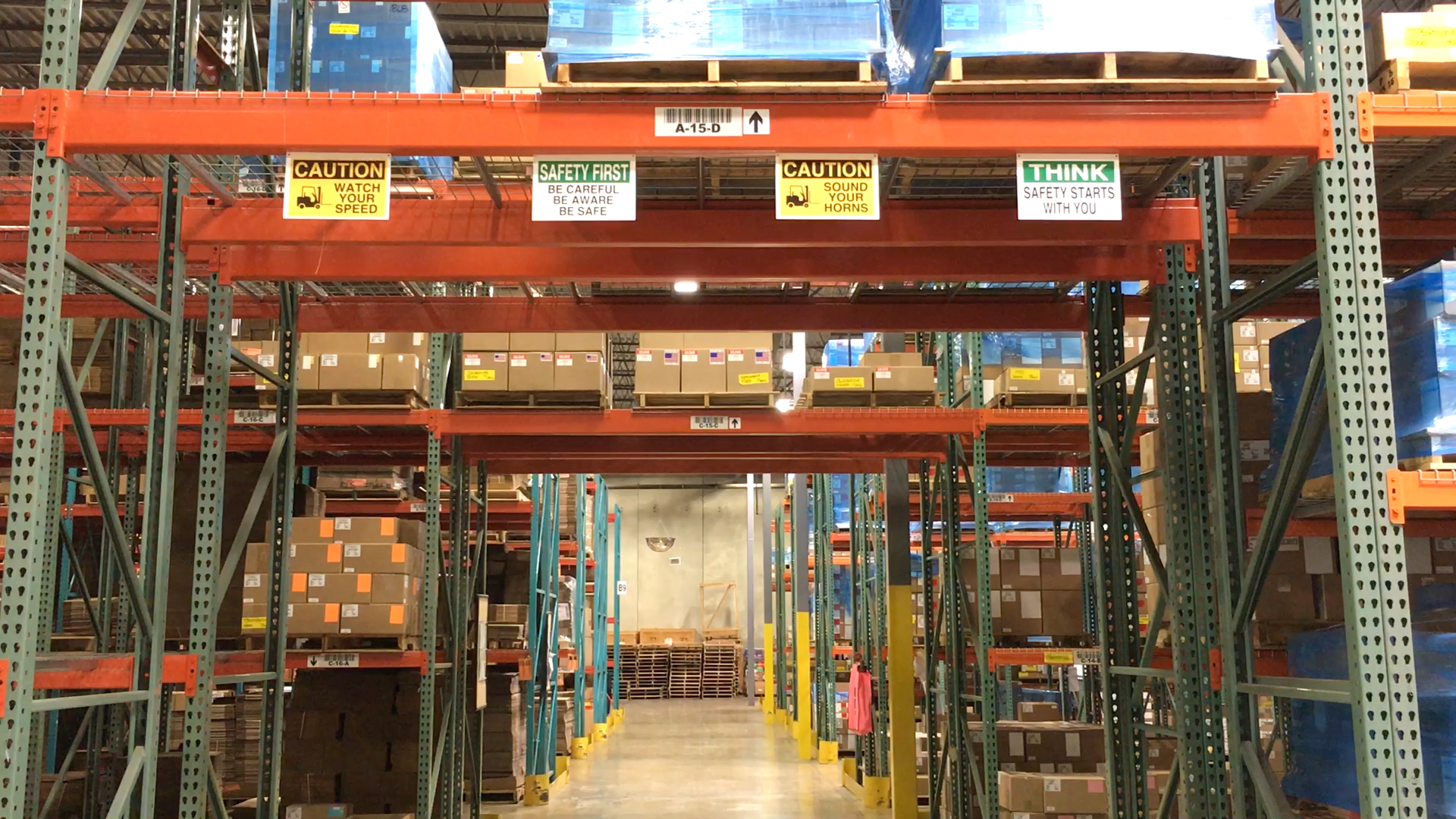 Long aisle of racks in a warehouse