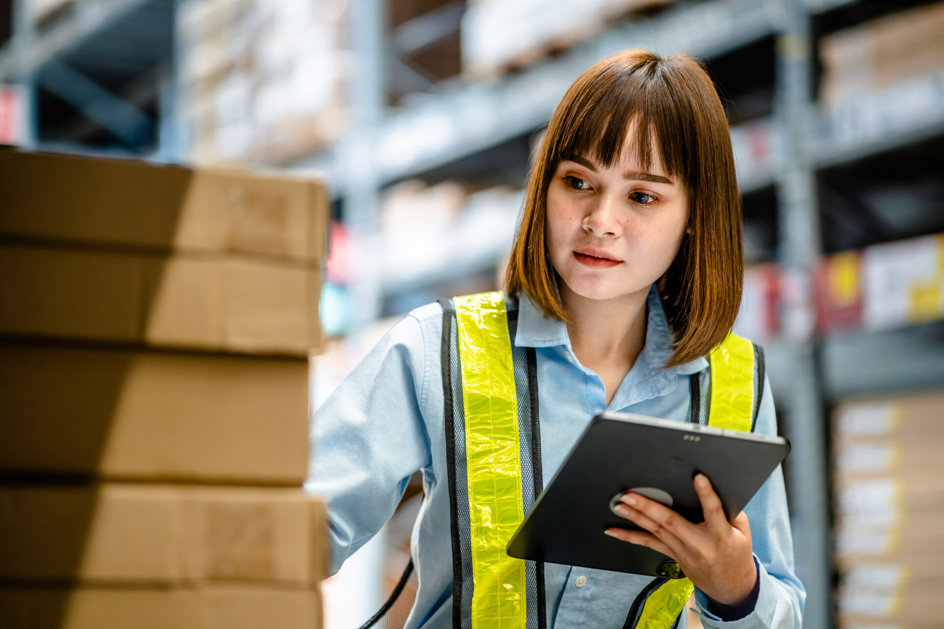 warehouse worker with a tablet