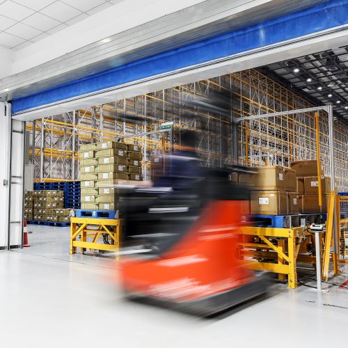 forklift moving in a warehouse