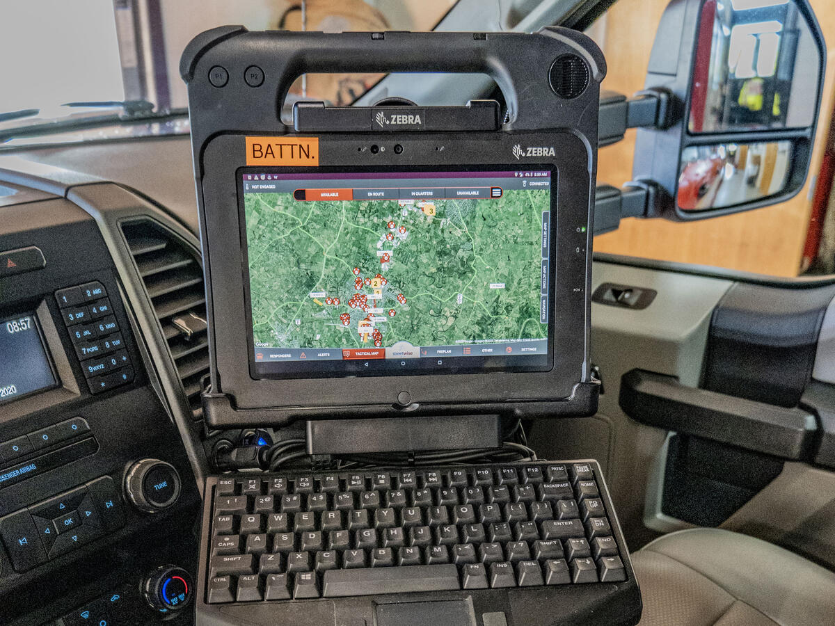 Worker using a Zebra rugged tablet in the field